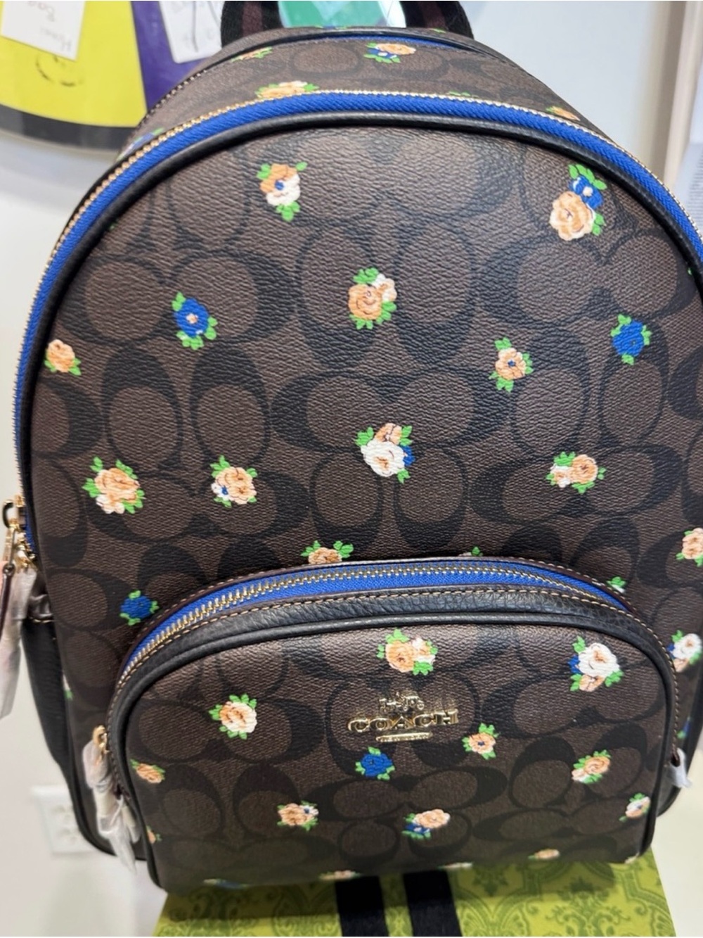 COACH Floral Signature Mini Backpack in Brown with Blue Accents